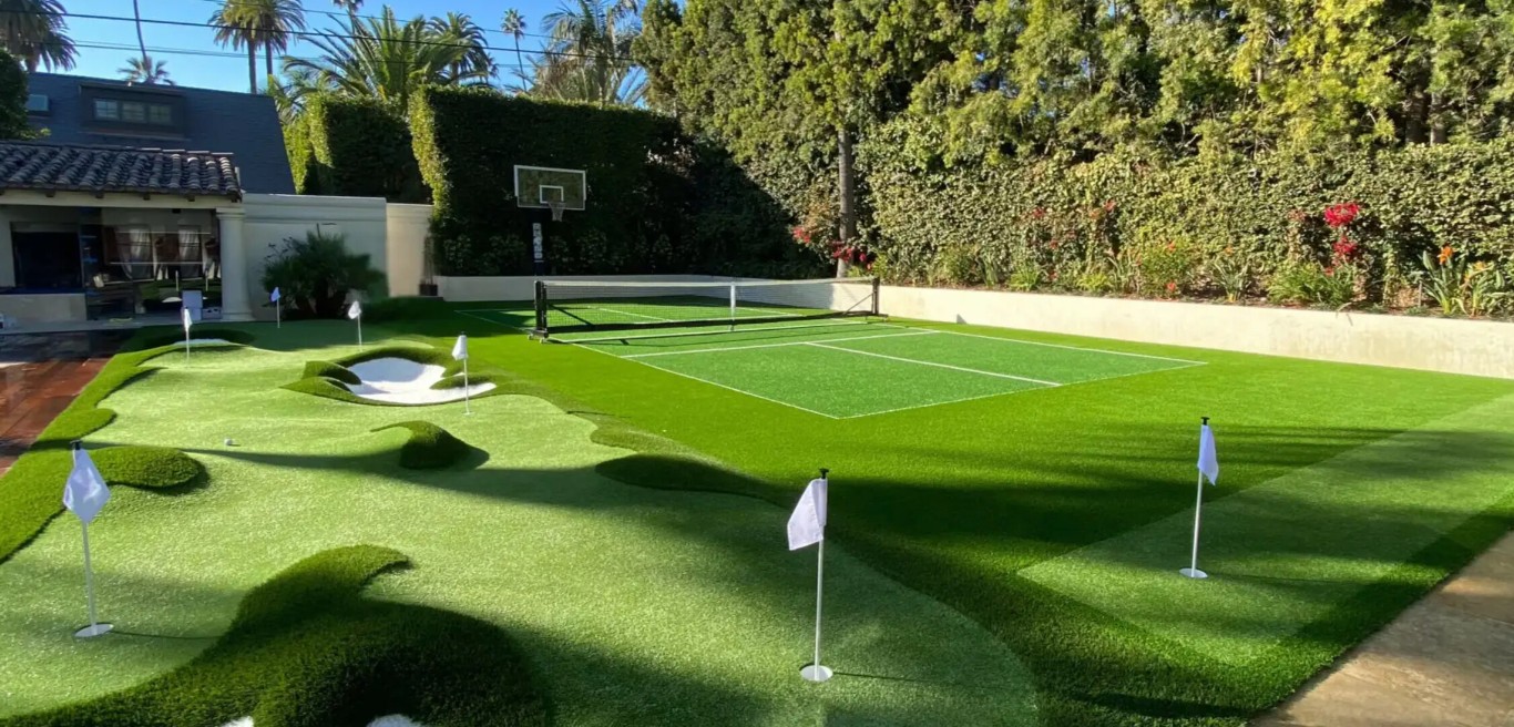 Custom backyard putting green with multiple holes in Pittsburg residential yard